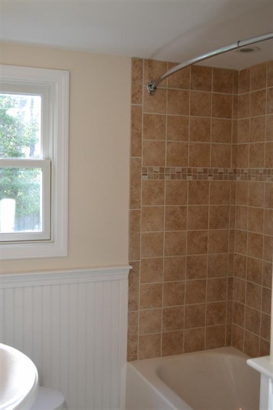 17 Wolley Road Hyannis, MA 02601 - Photo 7 of 11 a bathroom with a shower and a bathtub
