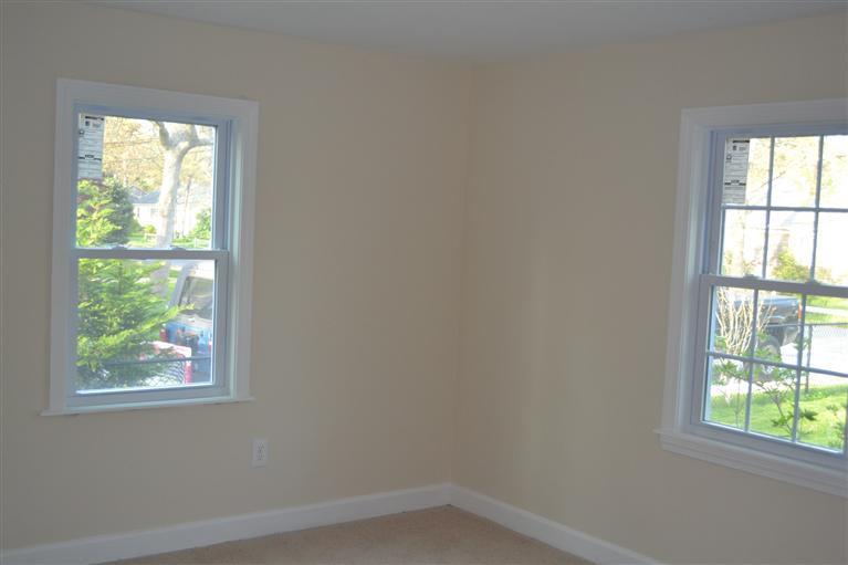 17 Wolley Road Hyannis, MA 02601 - Photo 10 of 11 an empty room with a window