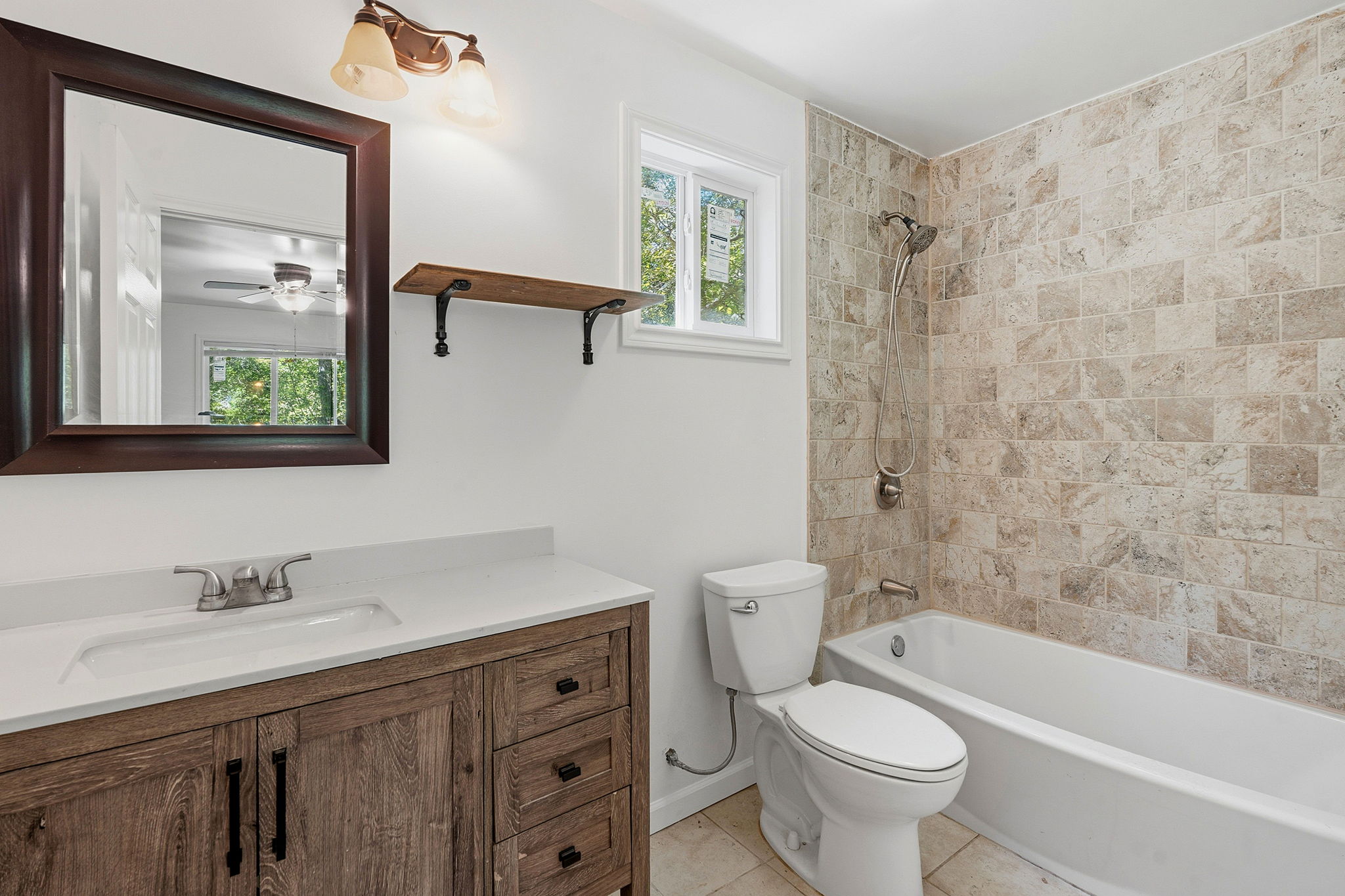 1998 Upper Elgin River Road Elgin, TX 78621 - Photo 14 of 28 a bathroom with a sink toilet and shower