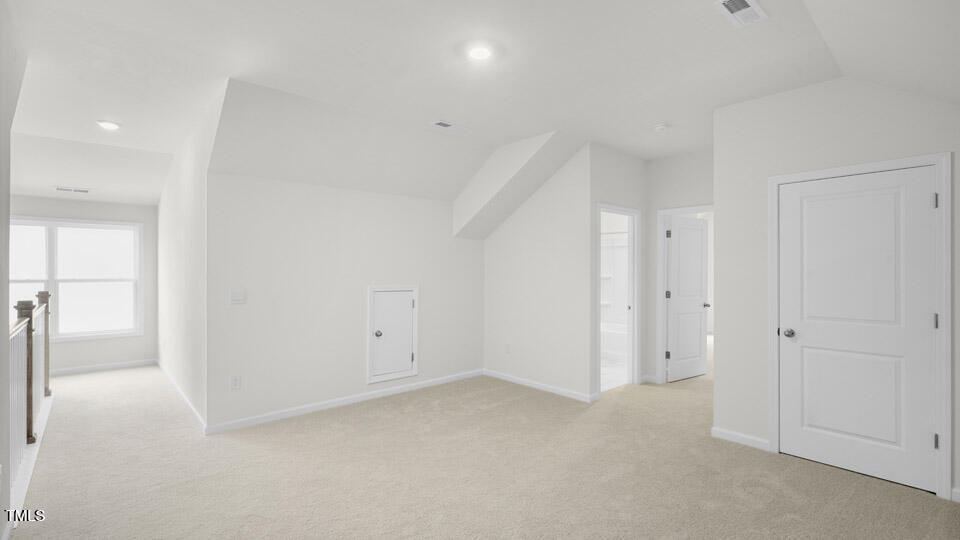 2222 Redpoll Drive Apex, NC 27539 - Photo 17 of 38 a view of an empty room