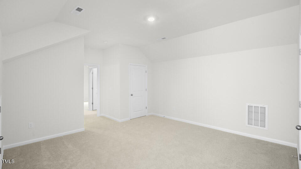 2222 Redpoll Drive Apex, NC 27539 - Photo 18 of 38 a view of an empty room