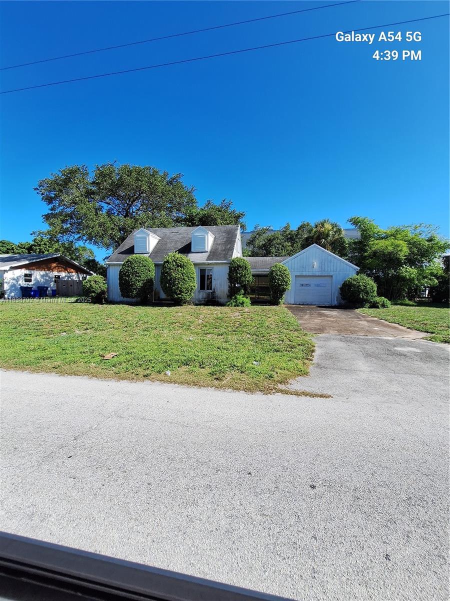 75 West 37th Street Riviera Beach, FL 33404 - Photo 1 of 2 Gallery Image 1