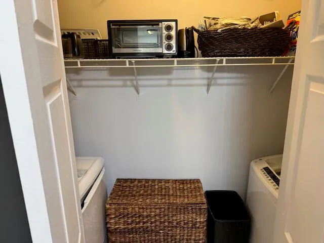 a close view of a sink and cabinets