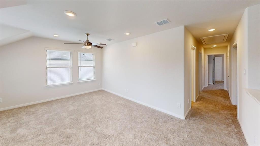 1840 Rosedale Avenue Van Alstyne, TX 75495 - Photo 10 of 24 Carpeted room featuring dual windows with blinds, a ceiling fan, and recessed lighting