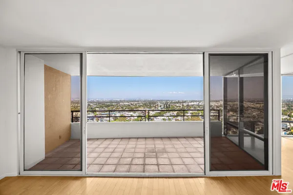 a view of a living room and bathroom