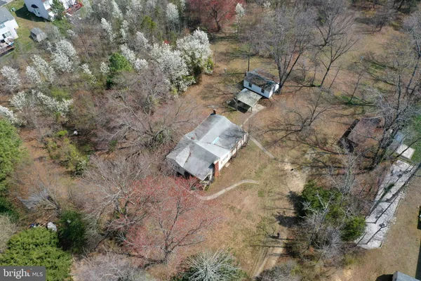 an aerial view of residential house with outdoor space