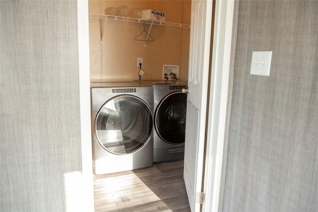 112 Southeast Front Street Bailey, TX 75452 - Photo 13 of 38 a utility room with dryer and washer