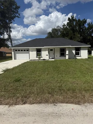 front view of house with a yard