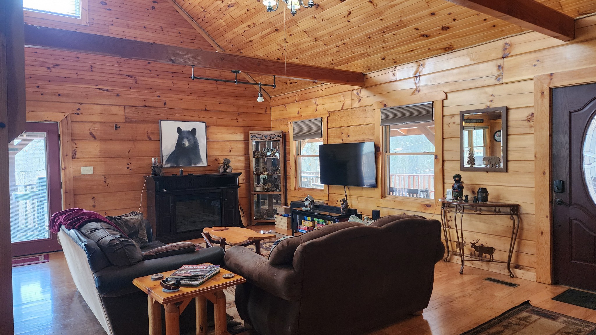 5615 Eastport Road Alpine, TN 38543 - Photo 36 of 83 a living room with furniture and a flat screen tv