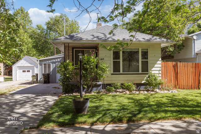 146 West 200 N Street Springville, UT 84663 - Photo 2 of 29 Single-story residence featuring a shingled roof, light-colored siding, and a manicured front lawn