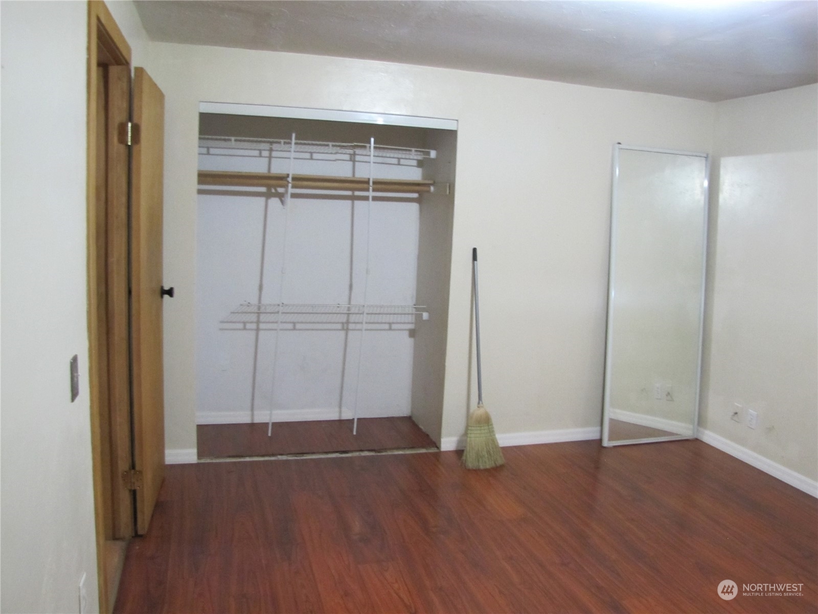252 Lavender Ridge Lane Sequim, WA 98382 - Photo 11 of 28 an empty room with wooden floor and closet