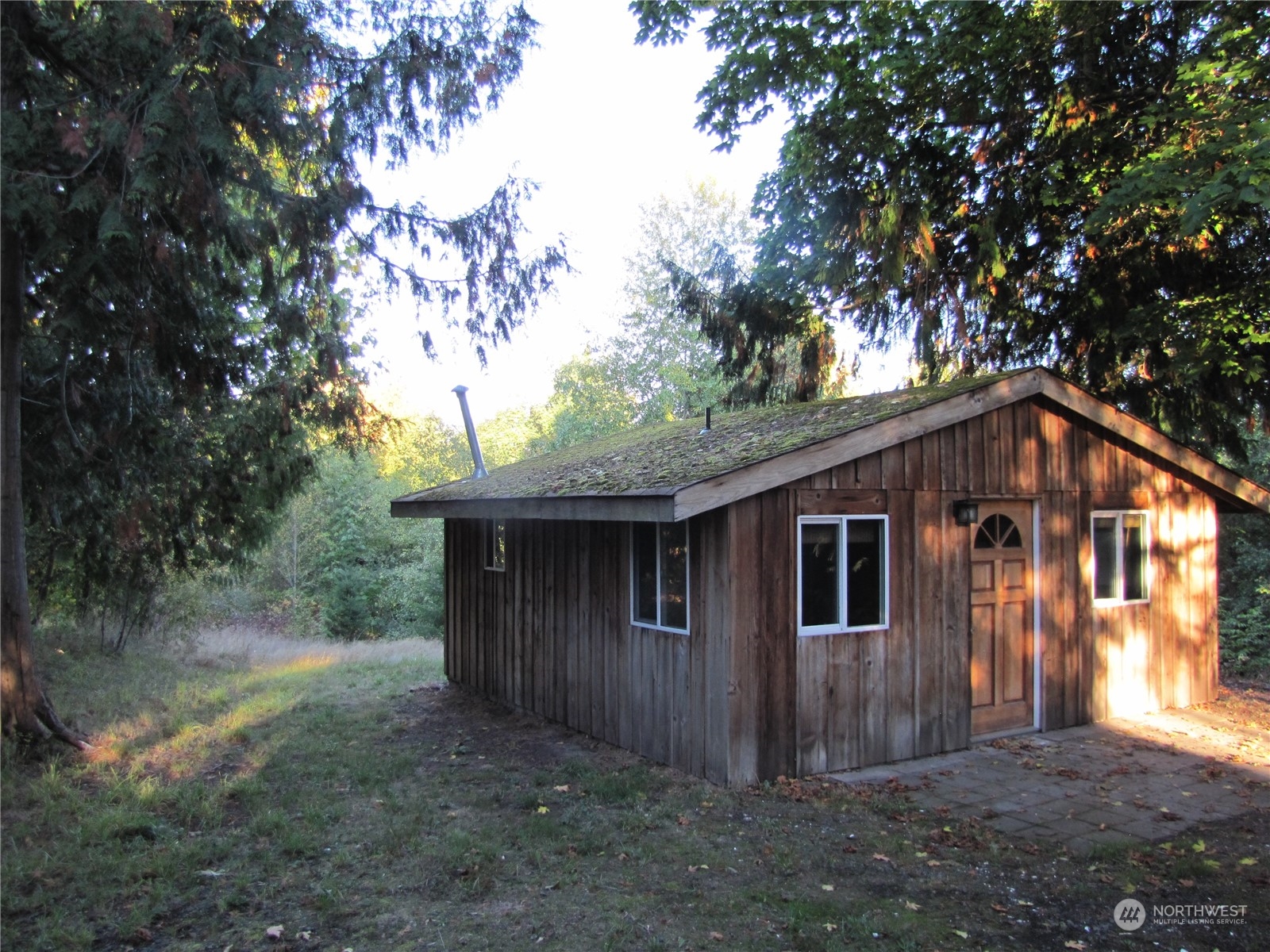 252 Lavender Ridge Lane Sequim, WA 98382 - Photo 19 of 28 a front view of a house with a tree