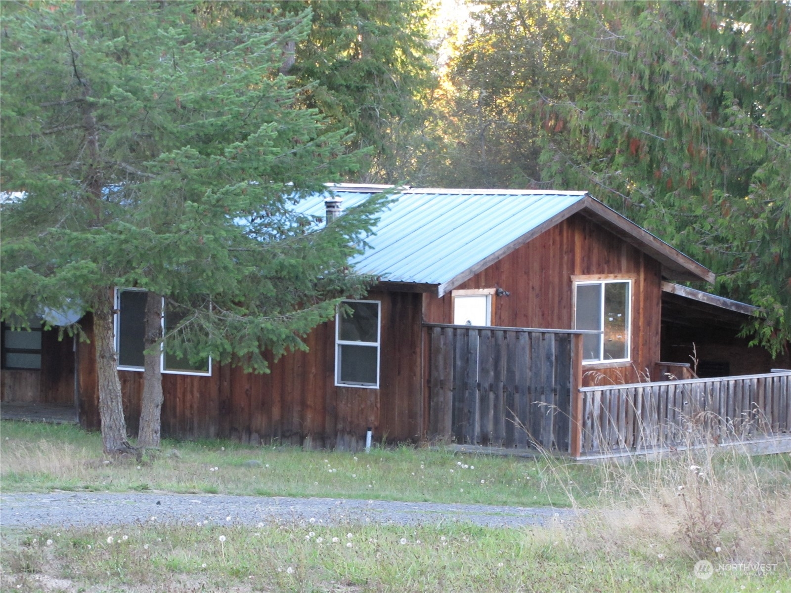 252 Lavender Ridge Lane Sequim, WA 98382 - Photo 25 of 28 a backyard of a house with lots of green space