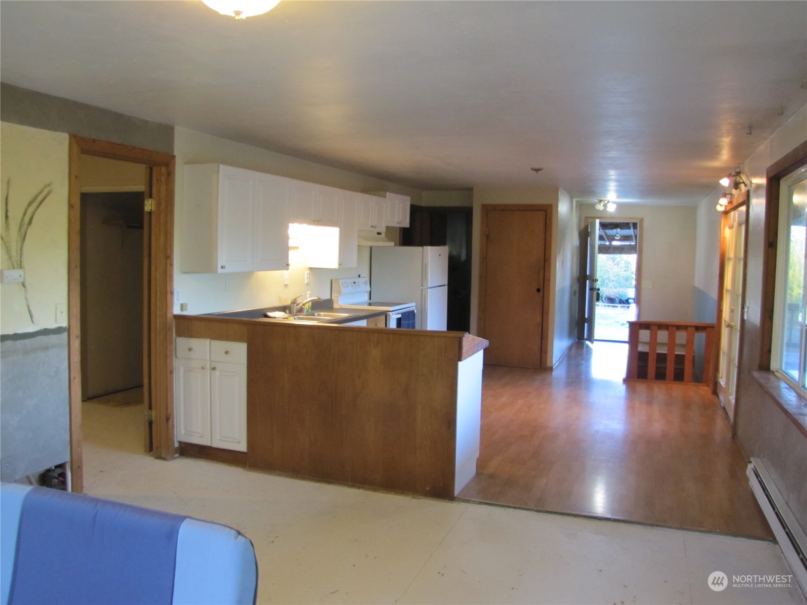 252 Lavender Ridge Lane Sequim, WA 98382 - Photo 5 of 28 a living room with furniture and a kitchen view