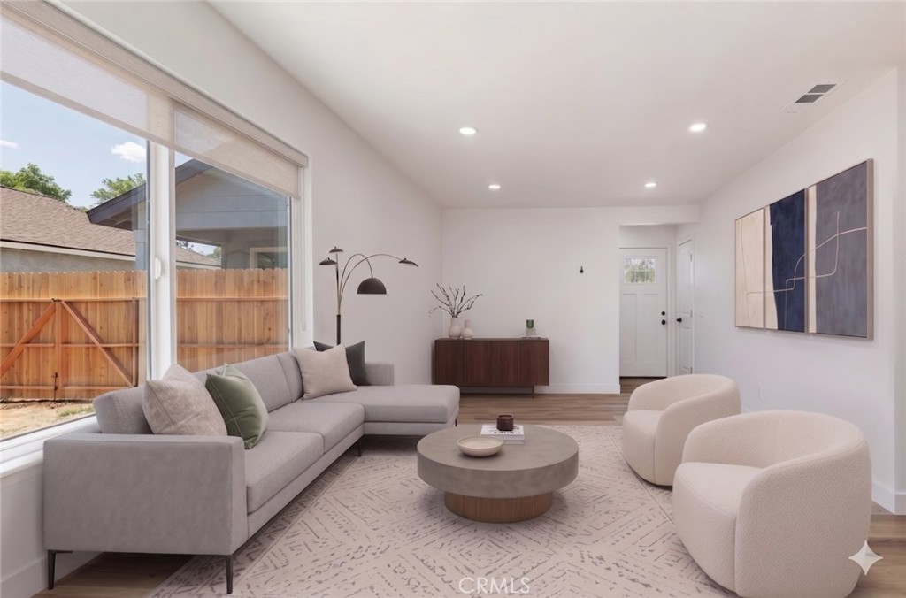 6940 Keating Drive Riverside, CA 92503 - Photo 7 of 15 a living room with furniture and a large window