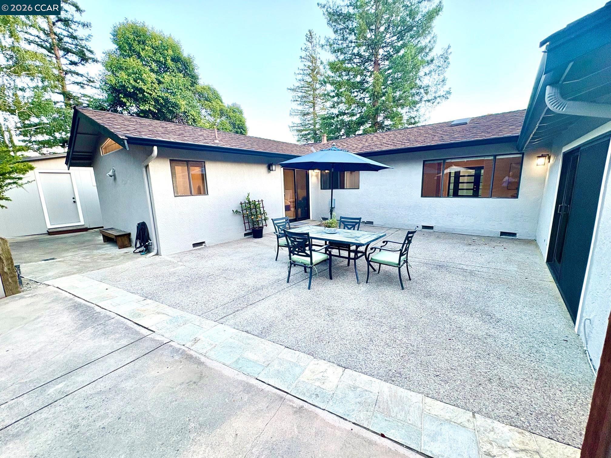 2589 Pebble Beach Loop Lafayette, CA 94549 - Photo 26 of 32 a view of a house with patio