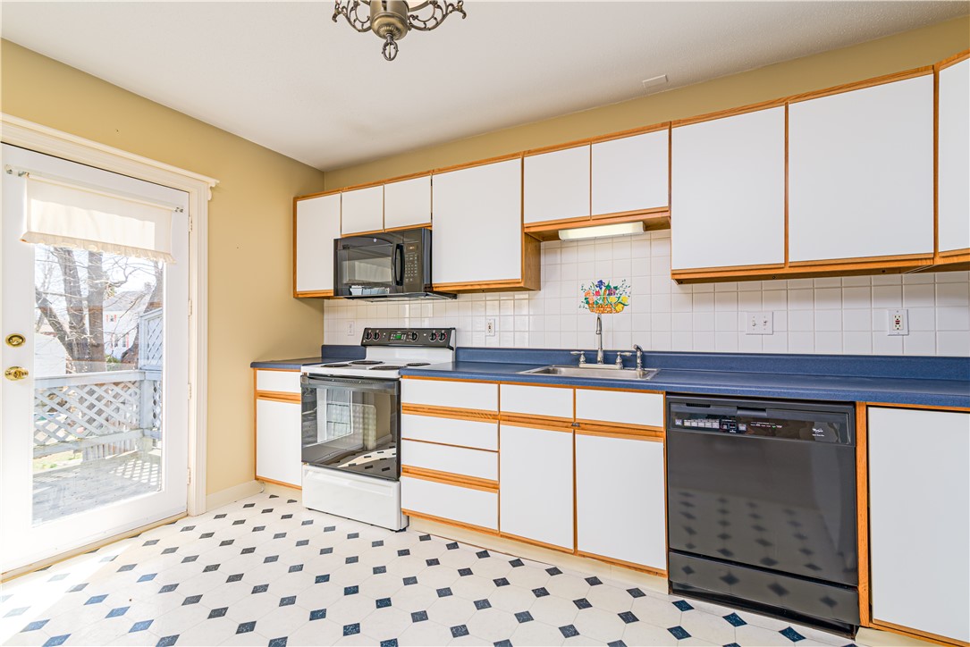 60 Margin Street, Unit 104 Westerly, RI 02891 - Photo 13 of 40 Access to the deck