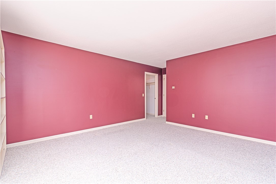 60 Margin Street, Unit 104 Westerly, RI 02891 - Photo 27 of 40 this bedroom is big enough for a king bed, a couple of bureaus, night stands and much more.