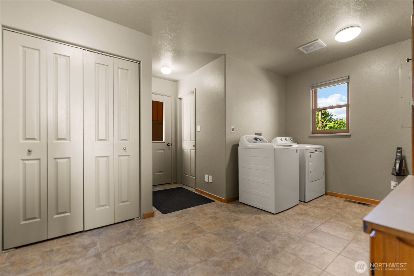 2621 Highway 153 Twisp, WA 98856 - Photo 18 of 40 a view of a utility room with closet and windows