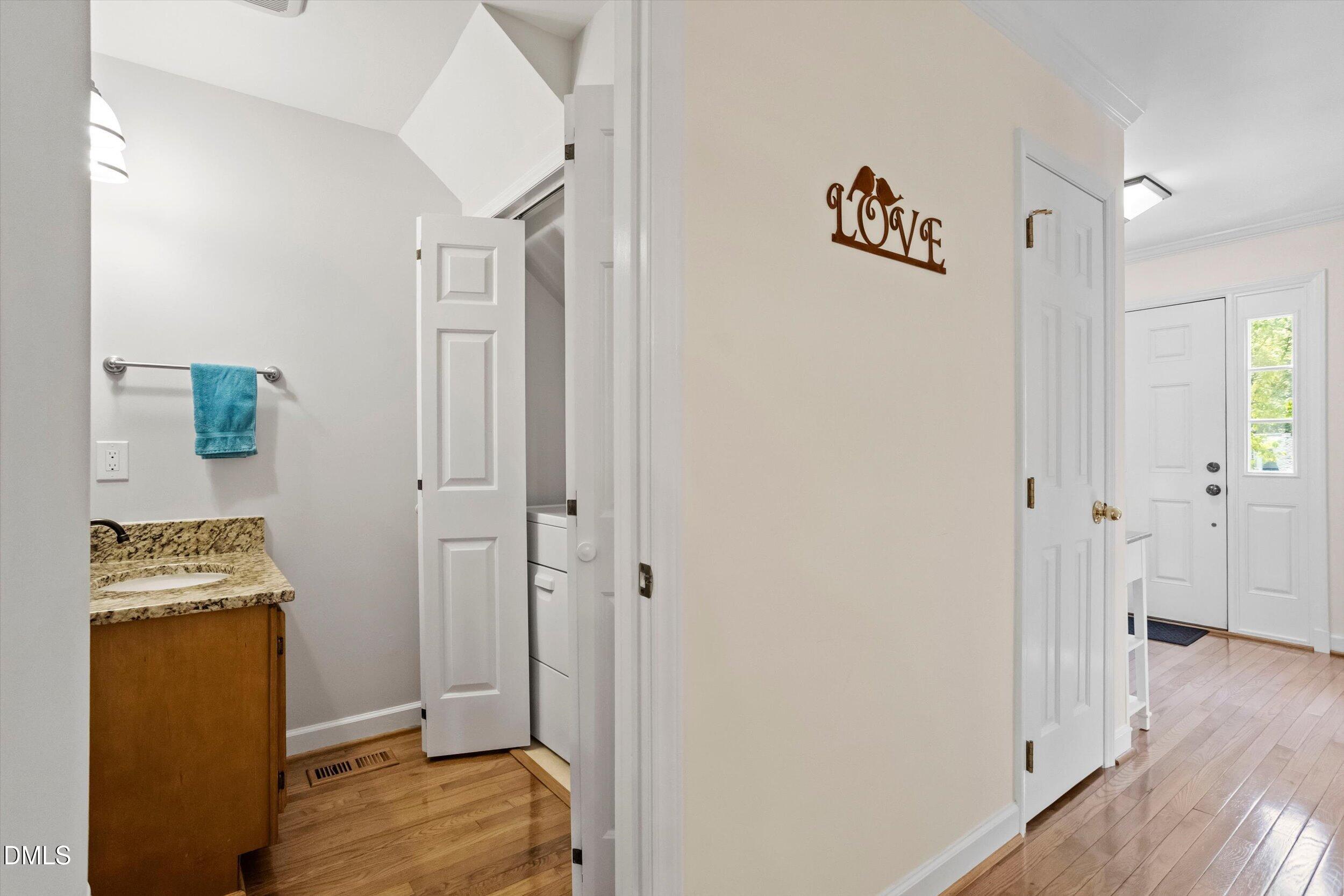 6707 Queen Annes Drive Raleigh, NC 27613 - Photo 16 of 33 Half Bath and Laundry
