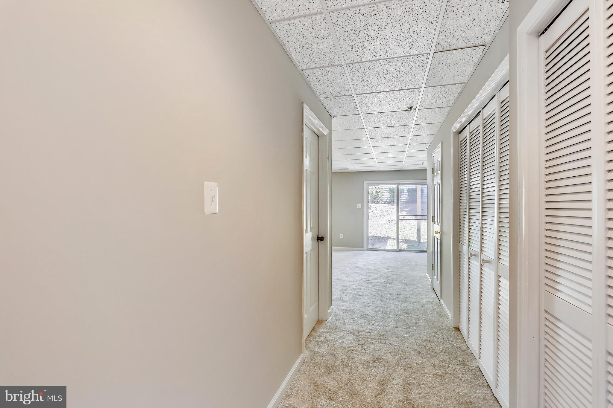 9408 Singleton Place Frederick, MD 21704 - Photo 27 of 49 hallway to family room on lower level