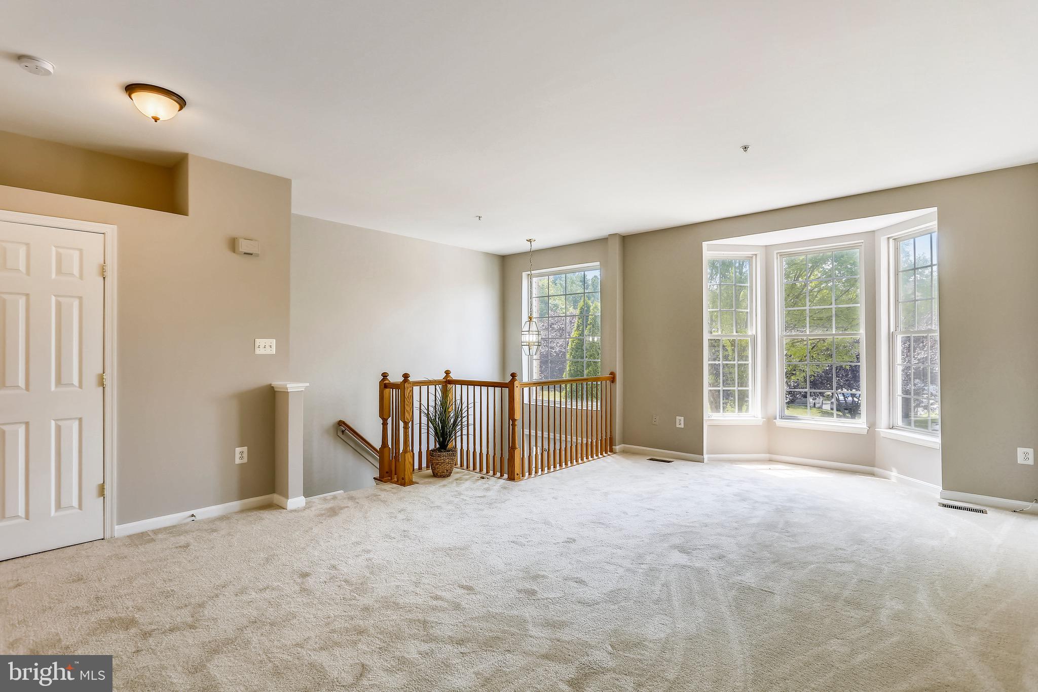 9408 Singleton Place Frederick, MD 21704 - Photo 5 of 49 Living area with great light and bay window