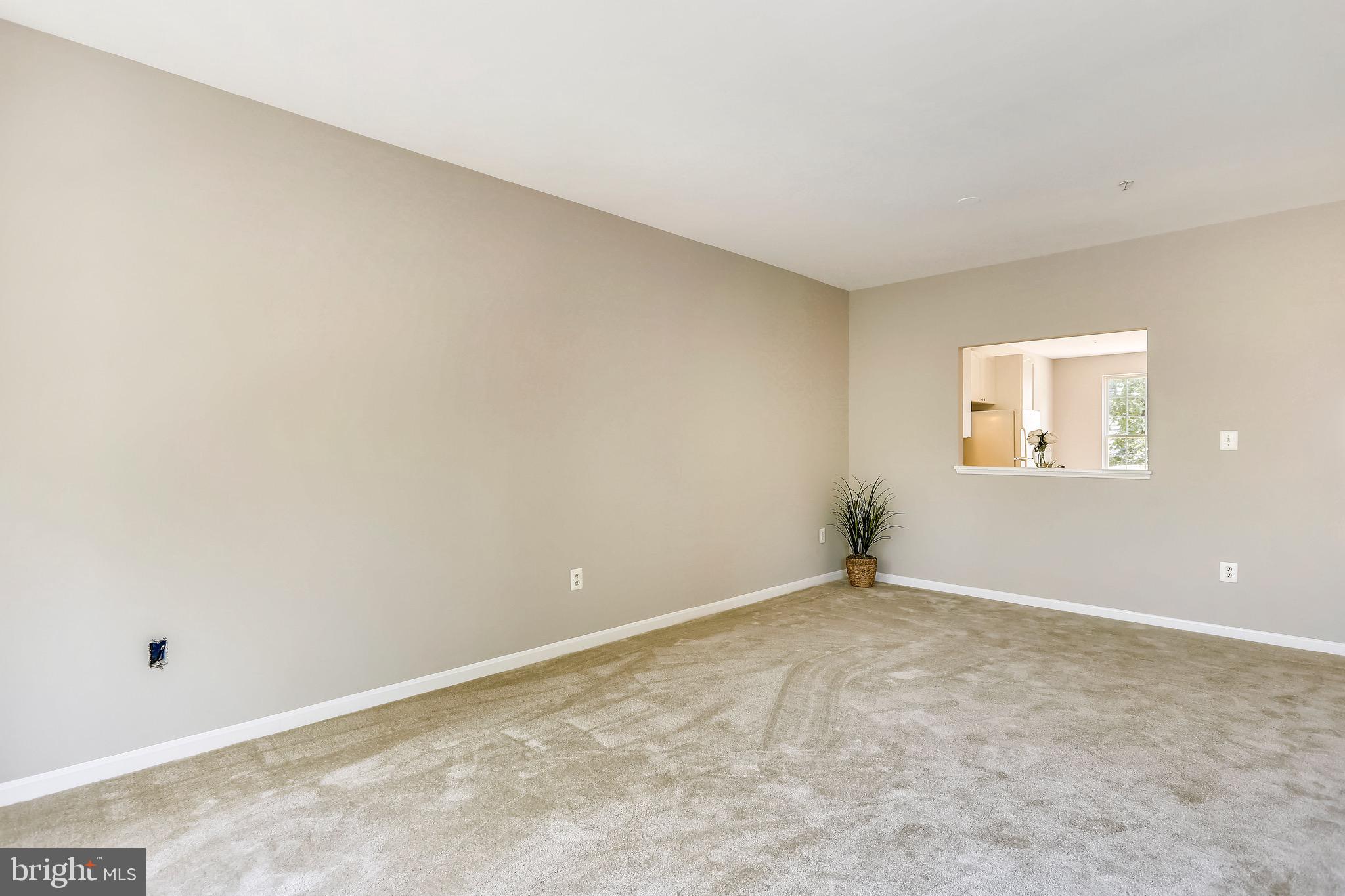 9408 Singleton Place Frederick, MD 21704 - Photo 7 of 49 Living room looking into kitchen