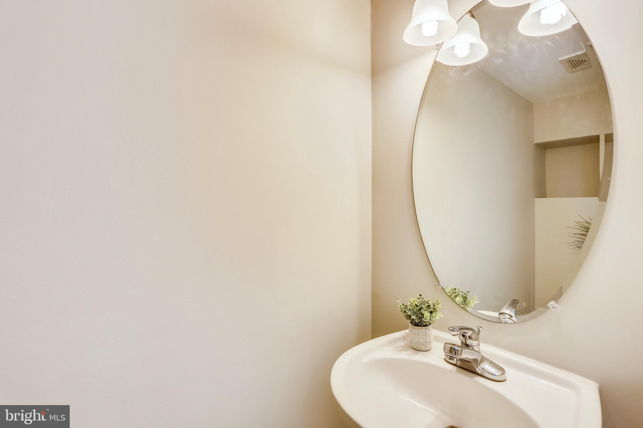 9408 Singleton Place Frederick, MD 21704 - Photo 8 of 49 Powder room off the living room.