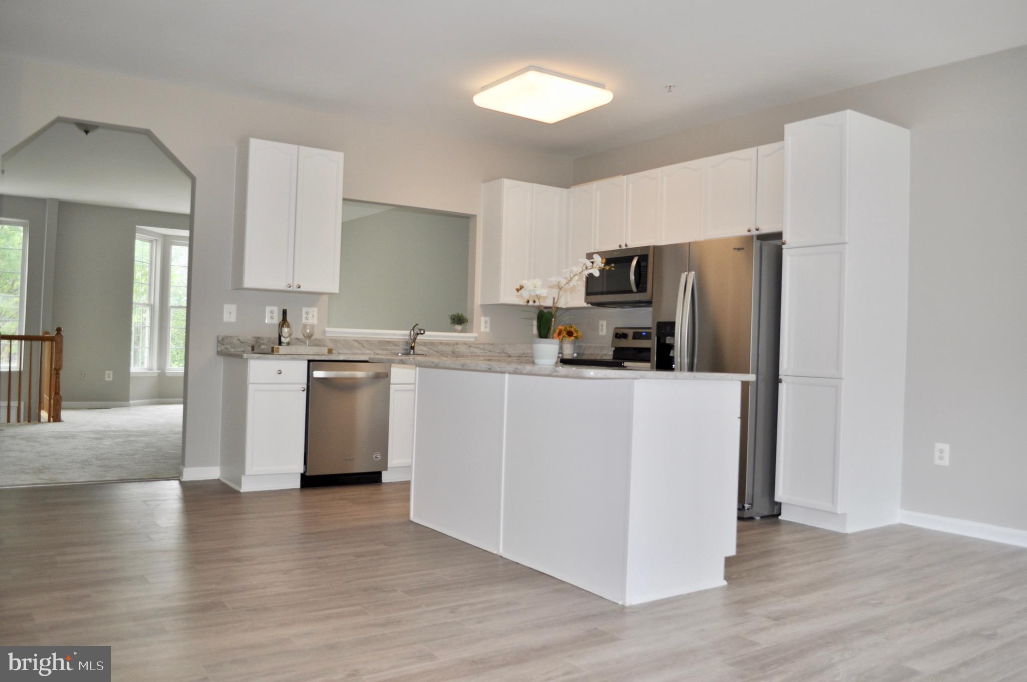 9408 Singleton Place Frederick, MD 21704 - Photo 9 of 49 Enormous Kitchen with granite and huge island