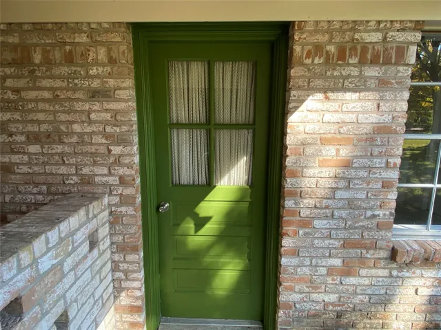 a view of a lake with couches chairs