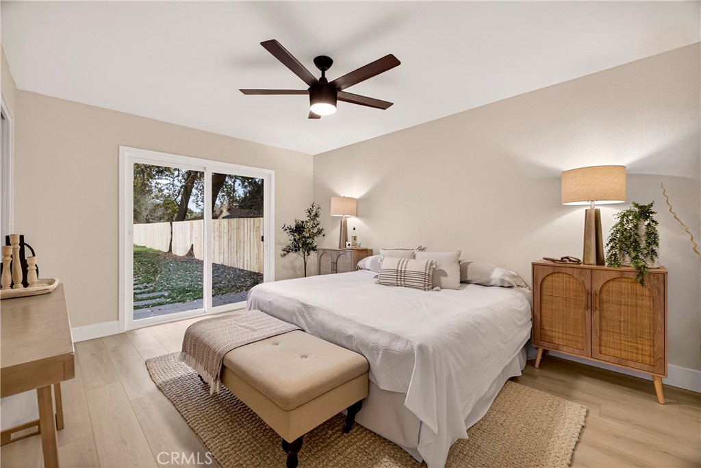 1623 Diamond Chico, CA 95928 - Photo 18 of 51 a bedroom with a bed a couch and a window