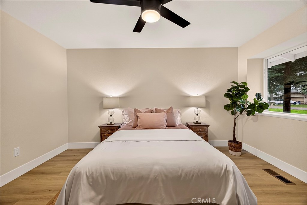 1623 Diamond Chico, CA 95928 - Photo 30 of 51 a bedroom with a bed and a potted plant