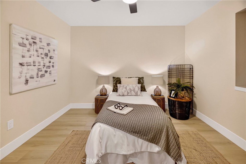 1623 Diamond Chico, CA 95928 - Photo 38 of 51 a bedroom with a bed and wooden floor