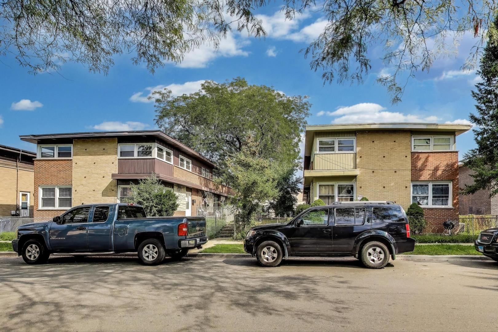a car parked in front of a house