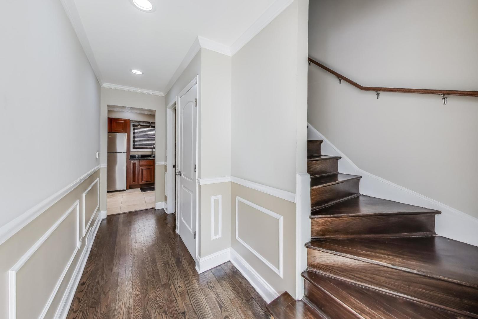 2019 Georgetown Lane, Unit 2019 Waukegan, IL 60085 - Photo 6 of 31 a view of entryway and hall with wooden floor