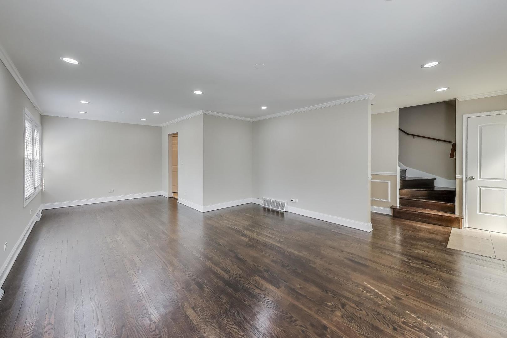 2019 Georgetown Lane, Unit 2019 Waukegan, IL 60085 - Photo 9 of 31 a view of empty room with wooden floor