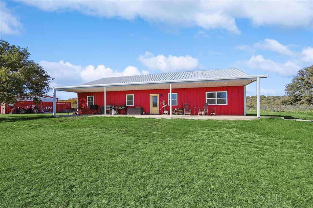 1161 Lynn Creek Road Jacksboro, TX 76458 - Photo 28 of 28 a front view of house with yard and garage
