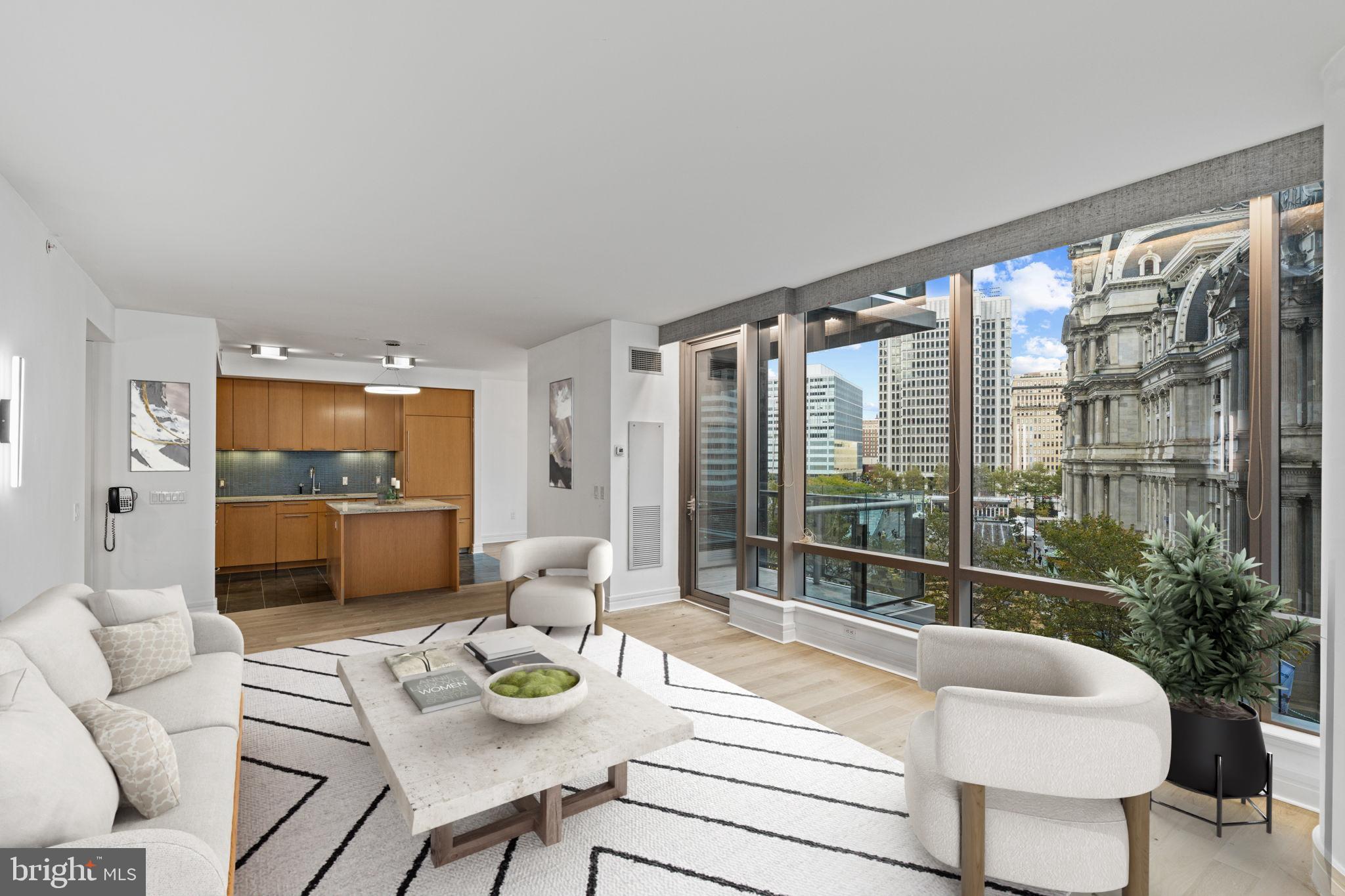 a living room with furniture and a table