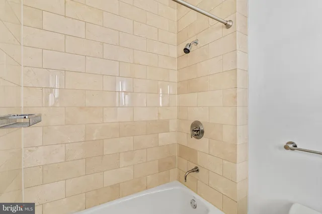 a bathroom with a sink double vanity and a mirror