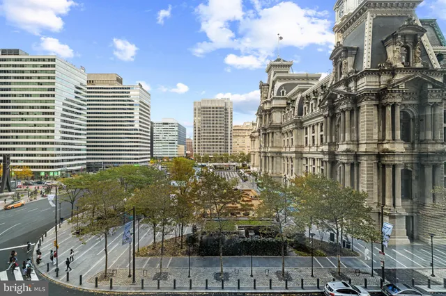 a view of a city with tall buildings