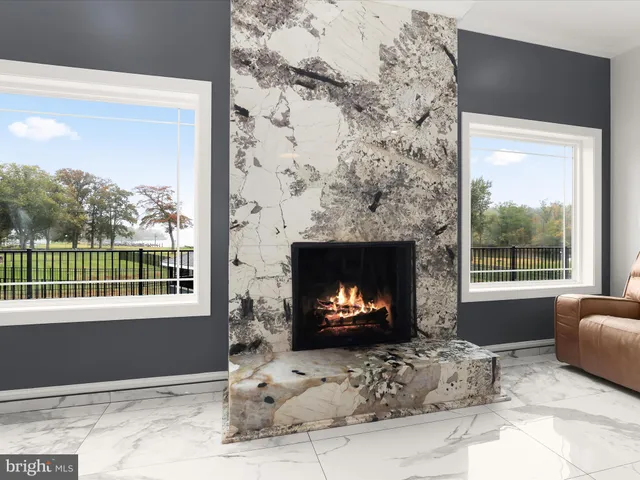 a kitchen with stainless steel appliances granite countertop a sink a stove and a wooden cabinets