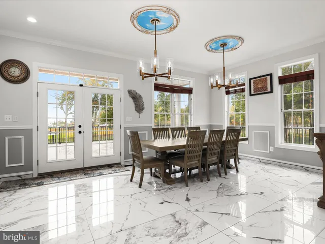 a kitchen with a stove a sink and a refrigerator