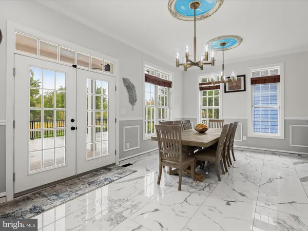 a bathroom with a toilet sink and shower