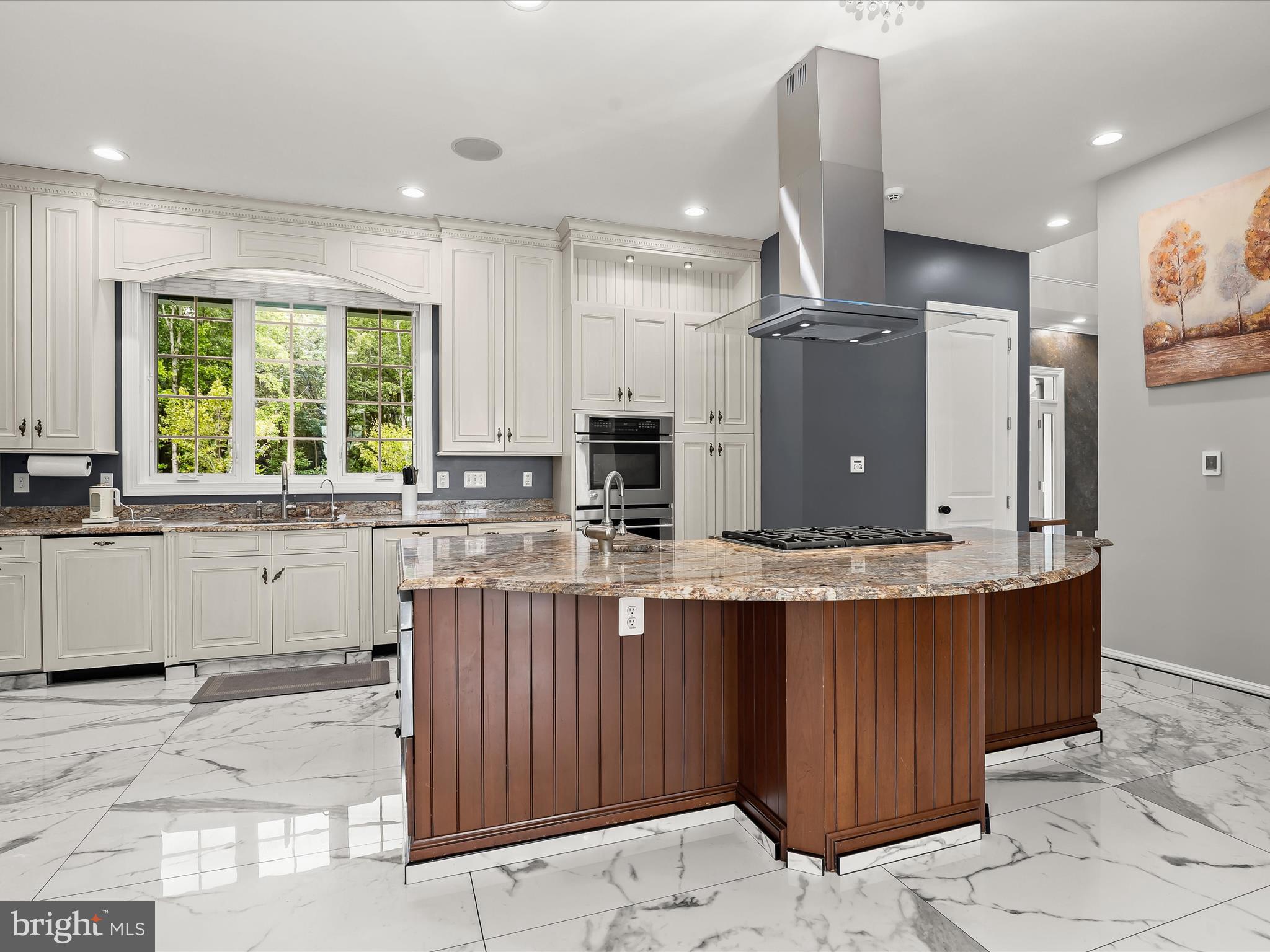 1315 South Seneca Road Middle River, MD 21220 - Photo 16 of 127 a kitchen with stainless steel appliances kitchen island granite countertop a sink and cabinets