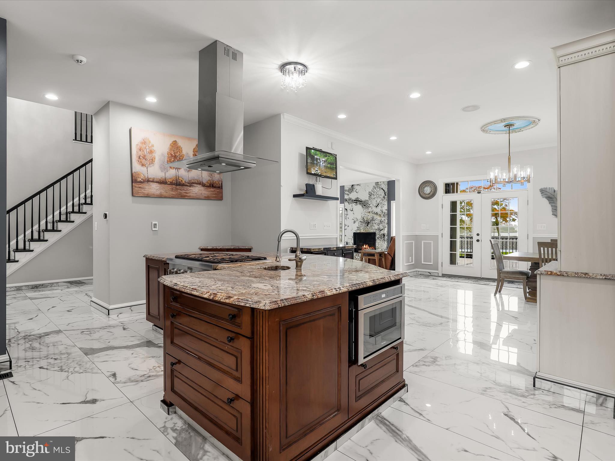 1315 South Seneca Road Middle River, MD 21220 - Photo 19 of 127 a kitchen with stainless steel appliances granite countertop a sink a stove and a wooden cabinets