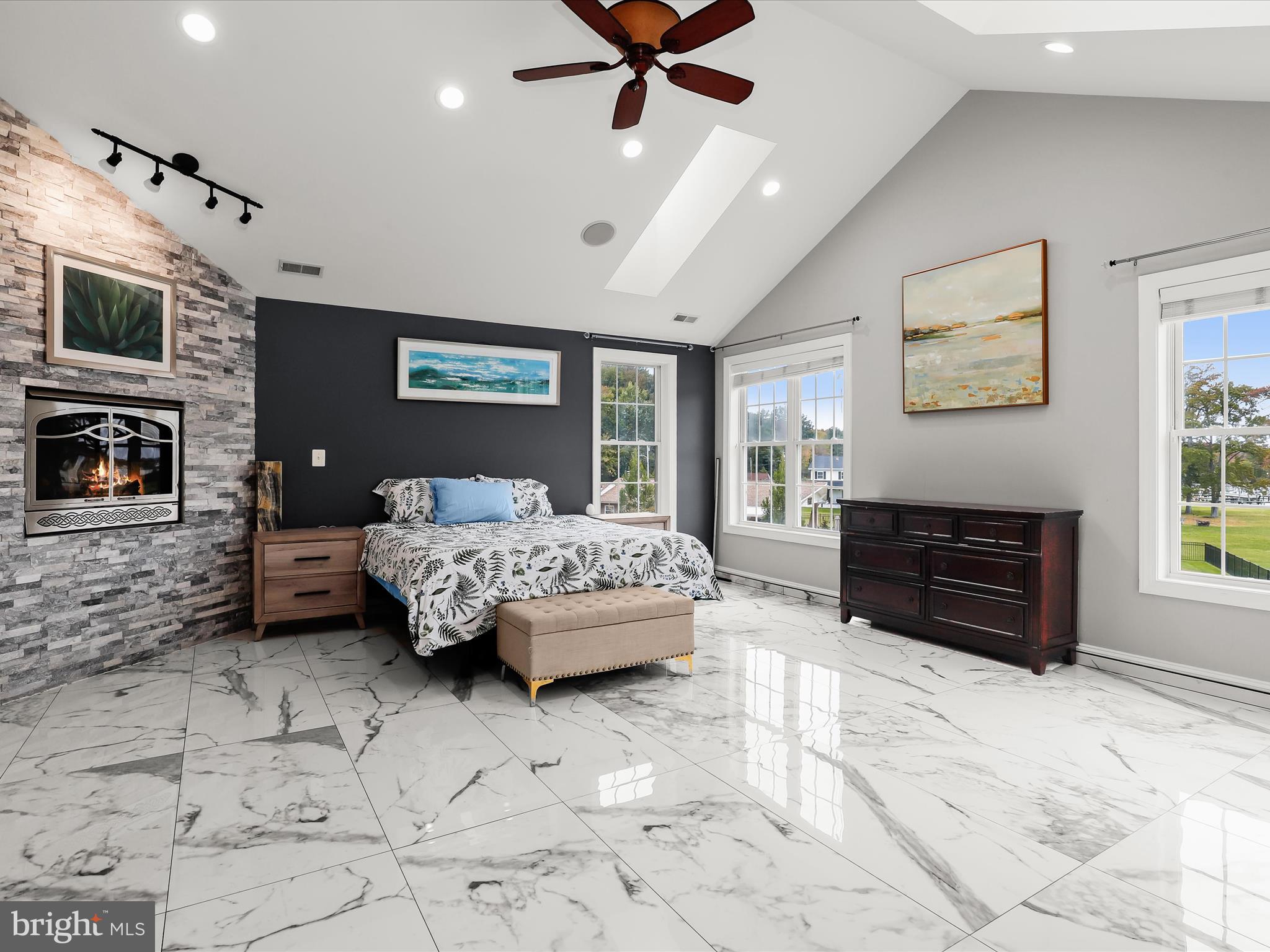 1315 South Seneca Road Middle River, MD 21220 - Photo 33 of 127 a bedroom with a bed dresser and a flat screen tv