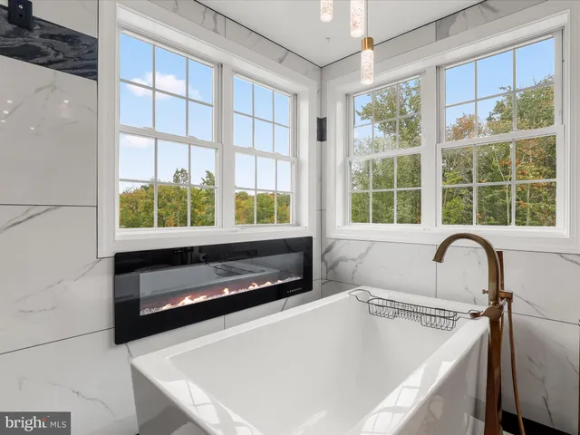 a view of a swimming pool and a yard