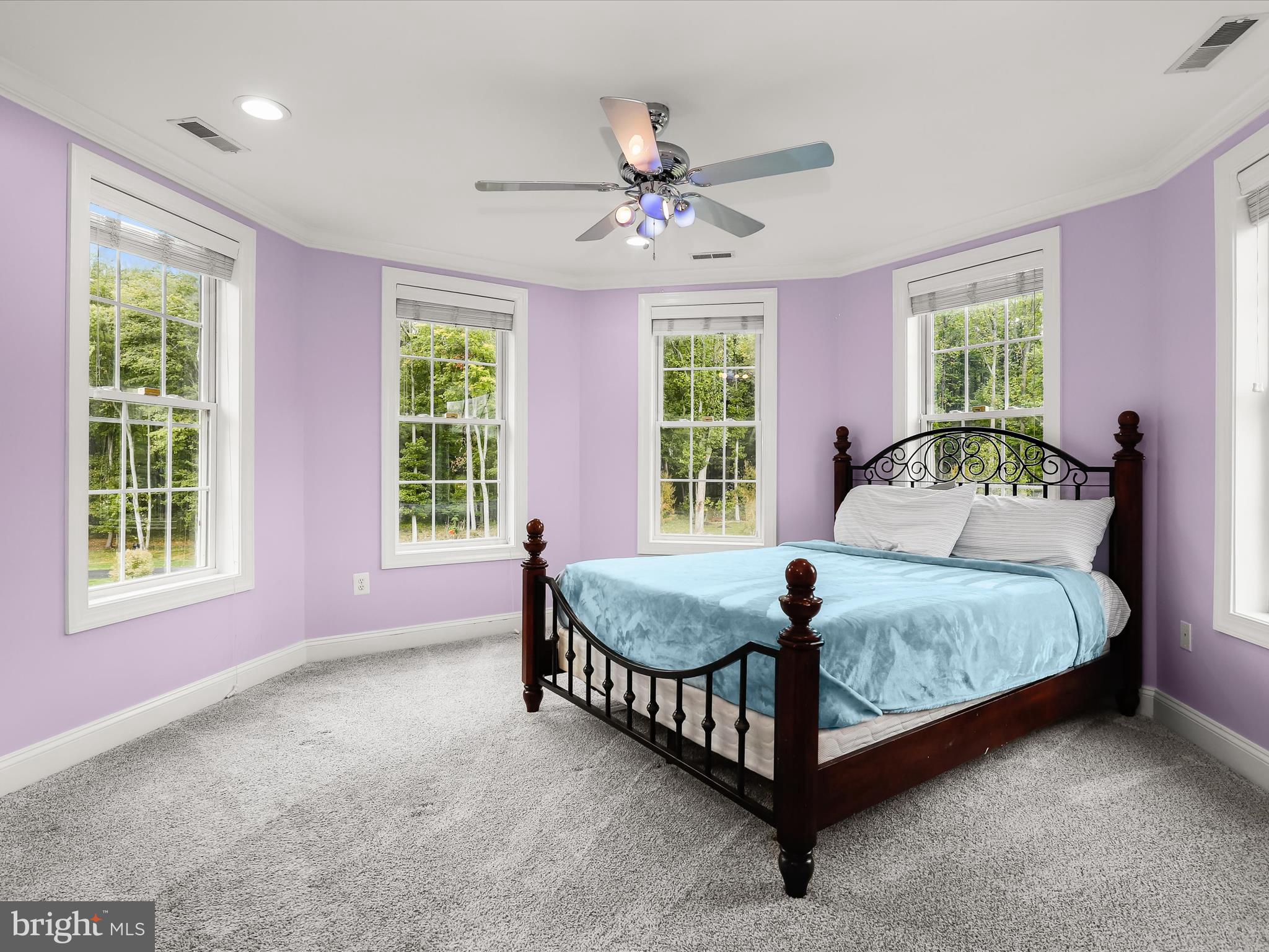 1315 South Seneca Road Middle River, MD 21220 - Photo 46 of 127 a bed sitting in a spacious bedroom next to a window