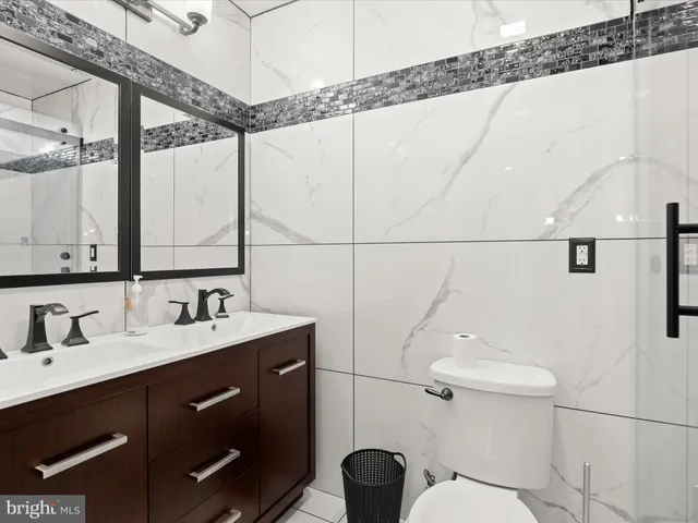 a view of a park with large trees