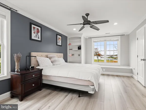 a front view of a house with a yard table and chairs